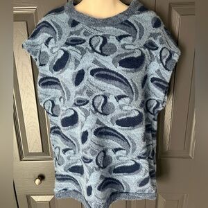 31- Zara sleeveless sweater